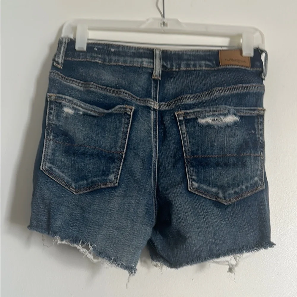 EUC American Eagle Next Level Stretch Blue Distressed Jean Shorts with Raw Hem - Picture 5 of 5